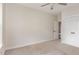 Bedroom with neutral color palette, closet with double doors and access to hallway at 10744 Cokesbury Ln, Raleigh, NC 27614