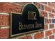 Close-up of the address sign displaying 