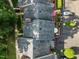 An aerial view showcasing the roof and landscaped courtyard of the townhome at 1112 Blenheim Dr, Raleigh, NC 27612