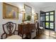 Welcoming foyer with hardwood floors, a console table, and decorative accents at 1112 Blenheim Dr, Raleigh, NC 27612