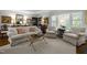 Well-appointed living room featuring stylish furniture and a warm, inviting ambiance at 1112 Blenheim Dr, Raleigh, NC 27612