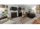 Inviting living room featuring a fireplace, stylish decor, and comfortable seating at 1112 Blenheim Dr, Raleigh, NC 27612
