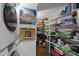 Walk-in pantry with plenty of shelving for food and appliance storage at 1112 Blenheim Dr, Raleigh, NC 27612