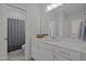 Bathroom boasts double vanity, granite countertops and modern fixtures at 117 Banning Dr, Pittsboro, NC 27312