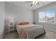 Comfortable bedroom with large window and neutral décor at 117 Banning Dr, Pittsboro, NC 27312