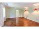 Large bedroom with hardwood floors and closet at 117 Carolina Forest Rd, Chapel Hill, NC 27516