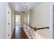 Hallway on second floor with hardwood flooring at 117 Carolina Forest Rd, Chapel Hill, NC 27516