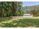 Picture of an outdoor horse enclosure next to a detached garage at 117 Carolina Forest Rd, Chapel Hill, NC 27516
