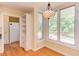 Breakfast nook with built-ins and windows with a backyard view at 117 Carolina Forest Rd, Chapel Hill, NC 27516