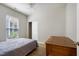 Bedroom with ample natural light, closet and hardwood floors at 118 Rosedale Creek Dr, Durham, NC 27703