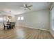 The living room features hard wood floors and has enough space for a dining table and a lounge area at 118 Rosedale Creek Dr, Durham, NC 27703