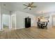 Large living room boasts wood floors and an open floor plan that connects to the dining area at 118 Rosedale Creek Dr, Durham, NC 27703