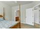 Relaxing main bedroom with ensuite bathroom featuring a four poster bed at 118 Rosedale Creek Dr, Durham, NC 27703