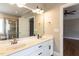 Bathroom features double sinks, a large mirror, vanity lighting and a separate shower, creating a functional and stylish space at 120 Gentle Rain Dr, Garner, NC 27529
