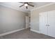 Bedroom features neutral carpet, a spacious closet, and ample natural light, perfect for relaxing at 120 Gentle Rain Dr, Garner, NC 27529