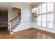 Dining room featuring crown molding, chair railings, neutral tones, and lots of natural light at 120 Gentle Rain Dr, Garner, NC 27529