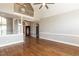 Open living room featuring a 2nd story view, natural light, and beautiful wood floors at 120 Gentle Rain Dr, Garner, NC 27529