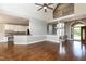 Spacious living room boasts vaulted ceiling, hardwood floors, and an open layout, perfect for entertaining guests at 120 Gentle Rain Dr, Garner, NC 27529