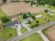 Aerial view showcases multiple buildings and acreage, perfect for expansion or investment at 12294 Nc Hwy 96 S, Dunn, NC 28334