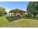 Spacious barn providing ample covered storage and workspace in a sprawling yard at 12294 Nc Hwy 96 S, Dunn, NC 28334