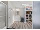 Bathroom featuring a walk-in shower, sink with storage, and a closet at 12294 Nc Hwy 96 S, Dunn, NC 28334