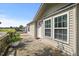 Well-maintained home exterior showcasing a charming porch and large windows for natural light at 12294 Nc Hwy 96 S, Dunn, NC 28334