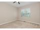 Bedroom with neutral walls and carpet, a window with blinds, and natural light at 161 Walking Path Pl, Hillsborough, NC 27278