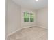 Bedroom with neutral walls, carpet, natural light, and a window with blinds at 161 Walking Path Pl, Hillsborough, NC 27278
