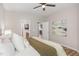 Bedroom with a view of the en-suite bathroom and a peek of the kitchen space at 161 Walking Path Pl, Hillsborough, NC 27278