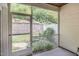 Covered porch with wooded views provides an inviting outdoor living space at 161 Walking Path Pl, Hillsborough, NC 27278