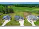 Aerial view of home showing large yard, driveway, and neighboring houses in a peaceful community at 173 Vinson Park Dr, Archer Lodge, NC 27527
