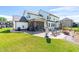Spacious backyard with a screened porch, patio, grilling area, and well-maintained lawn perfect for outdoor entertaining at 173 Vinson Park Dr, Archer Lodge, NC 27527