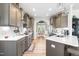 Modern kitchen with sleek countertops, ample cabinetry, stainless steel appliances, and open layout at 173 Vinson Park Dr, Archer Lodge, NC 27527