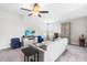 Spacious living area with a ceiling fan, comfortable seating, and entertainment center at 173 Vinson Park Dr, Archer Lodge, NC 27527