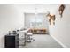 Bright office with a white desk, natural light, and deer and turkey taxidermy wall decor at 173 Vinson Park Dr, Archer Lodge, NC 27527