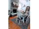 Charming dining room features a fireplace and a table set for a meal at 1837 Garrett House Trl, Burlington, NC 27215