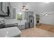 Recently renovated kitchen adjacent to living room, featuring new appliances at 1837 Garrett House Trl, Burlington, NC 27215