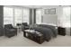 Serene main bedroom with large windows, neutral tones, and comfortable seating area at 2010 Kapalua Way # 192, Durham, NC 27703