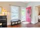 Bright entryway with hardwood floors and natural light at 203 Brick St, Wake Forest, NC 27587