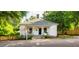 Charming home with a welcoming porch, flower boxes, and curb appeal at 203 Brick St, Wake Forest, NC 27587