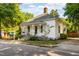 Charming home with white siding, inviting front porch, and well-manicured landscaping at 203 Brick St, Wake Forest, NC 27587