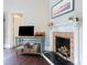 Living room with brick fireplace at 203 Brick St, Wake Forest, NC 27587