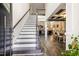 Grand entryway with staircase, hardwood floors, and views into the living and dining spaces at 211 Education Dr, Spring Lake, NC 28390
