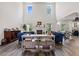 Bright living room with tall ceilings, a cozy fireplace, and an open floor plan at 211 Education Dr, Spring Lake, NC 28390