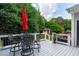Back deck featuring outdoor seating and a shed with a red door at 2112 Tulare Ct, Raleigh, NC 27612