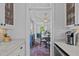 Dining room with hardwood floors, elegant chandelier, and ornate rug at 2112 Tulare Ct, Raleigh, NC 27612