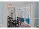 Open-concept dining room flowing to a stylish living area at 2112 Tulare Ct, Raleigh, NC 27612