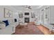 Inviting living room featuring a fireplace, built-in bookshelves, and comfortable seating at 2112 Tulare Ct, Raleigh, NC 27612