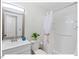 Cozy bathroom featuring a shower, vanity, and new fixtures at 216 Brook Ln, Durham, NC 27712