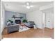 Cozy living room with fireplace, hardwood floors and modern furniture at 216 Brook Ln, Durham, NC 27712
